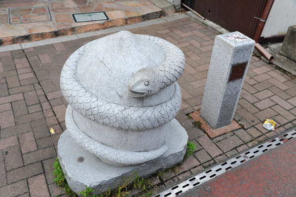 Carving of a coiled snake, Narita