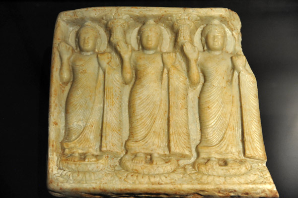 Carved marble plaque with 3 Buddha images, 7th C. AD, Pidurangala-Sigiriya