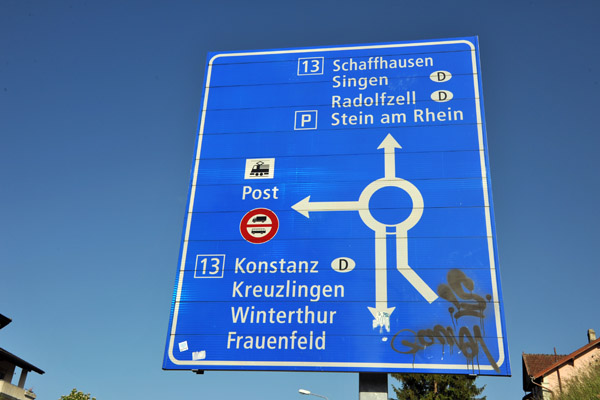 Road sign to Swiss and German cities around Stein am Rhein