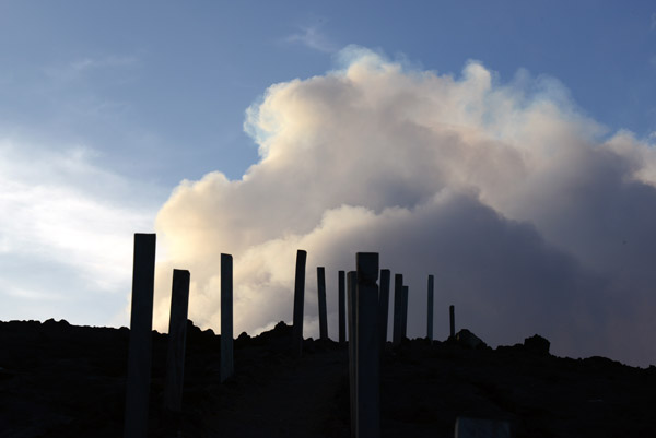 Billowing clouds forming at the summit of Mount Yasur
