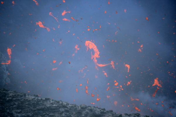 Lava bombs erupting from the crater, Mount Yasur