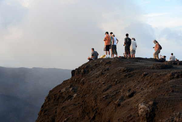 Tourists on the rim of Mount Yasur