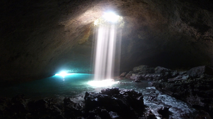 It wasn't easy to climb up onto the sharp, slick rocks of the Blue Cave