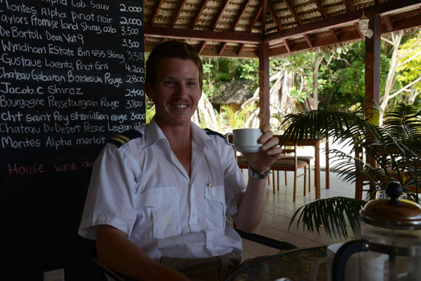 Unity Airlines Islander pilot relaxing at the Tanna Evergreen Resort before his flight
