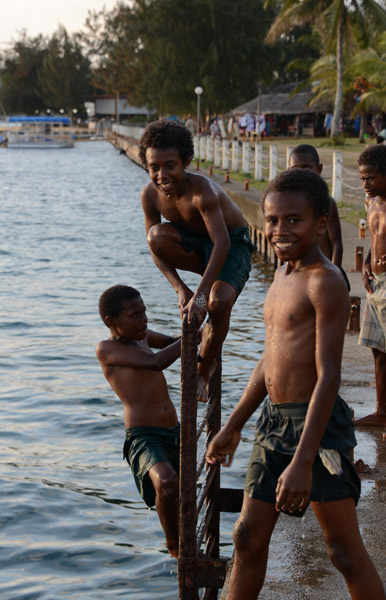 Port Vila boys playing at the waterfront