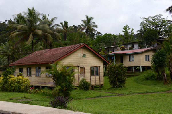 Wooden houses along Kings Road, Fiji