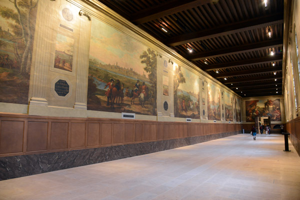 Corridor with large paintings of various fortified cities in the  Netherlands and nearby Rhineland