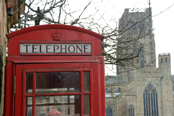 Red telephone box with Durham Cathedral