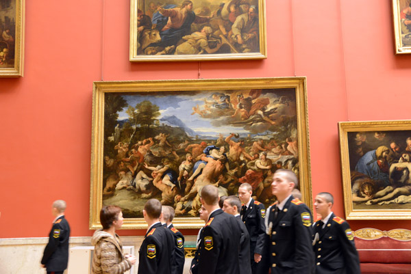 Group of uniformed Russian visitors at the Hermitage in front of Luca Giordano's Battle of Lapiths and Centaurs (17th C.)