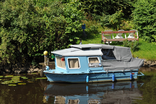 Little blue canal boat Frenga, Friedrichstadt