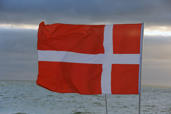 Danish flag straight out in the wind, Westerland (Sylt)