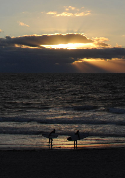 Surfers at sunset, Sylt