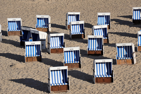 Strandkorb beach chairs turned to face the morning sun, Westerland (Sylt)