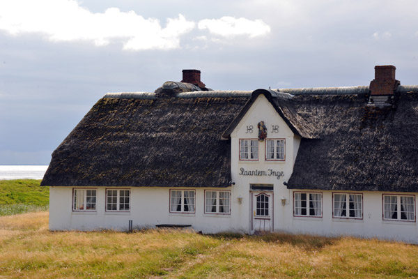 While many of the houses in Rantum are new, some are old like this one dated 1818