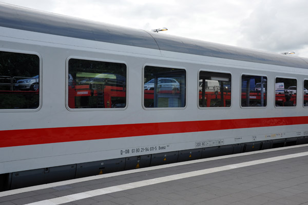 Reflection of the AutoZug in the windows of the InterCity