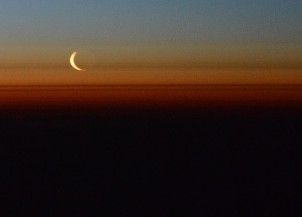 Crescent moon low on the polar horizon