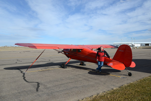 Posing with the red taildragger