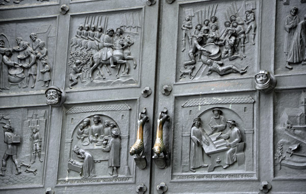 Detail of the bronze doors of the Grossmnster, Zrich