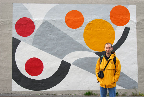 Roy with a mural in Reykjavik