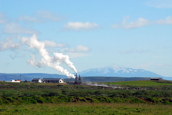 Geothermal power on a farm with Mount Hekla in the distance