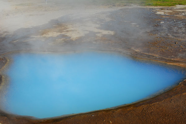 Milky water of a hot spring at Geysir