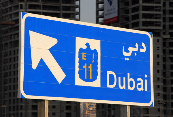 Roadsign for highway E11 to Dubai, Sheikh Zayed Road