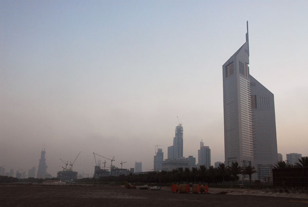 Emirates Towers and Sheikh Zayed Road at dusk