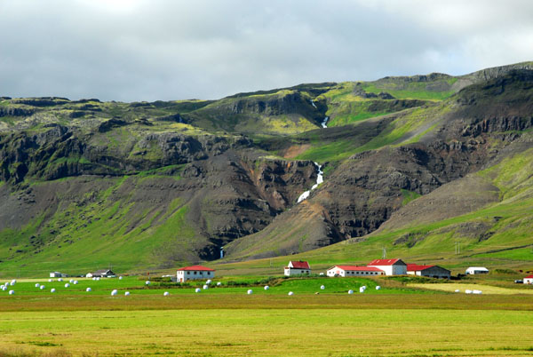 Waterfall behind a farm, Snfellsnes Peninsula