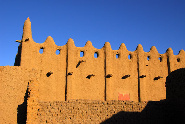 Sahel (Sudanese) style mudbrick mosque in a village on the Djenné access road