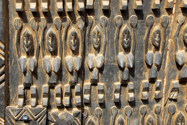 Detail of the carved door at the hotel/restaurant, Tireli