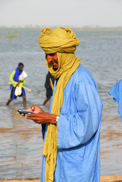 Tuarge man with mobile phone