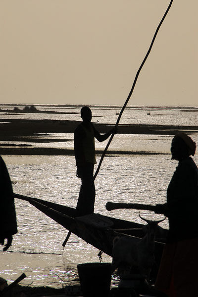 Silhouette of a pirogue driver