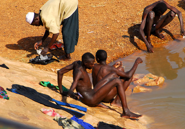 Men bathing in the Niger River, Niamey