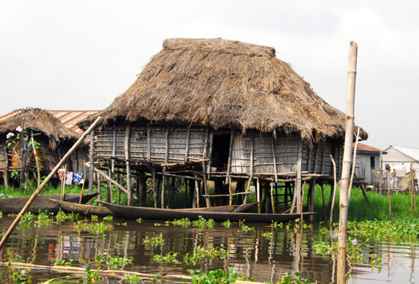 Typical Ganvié thatched hut built on stilts, Lac Nakoué, Bénin