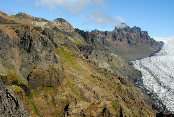 As the trail climbs, the terrain gets more rugged