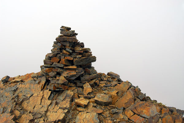 Stone cairn at the summit of Kristnartindar (1126m)