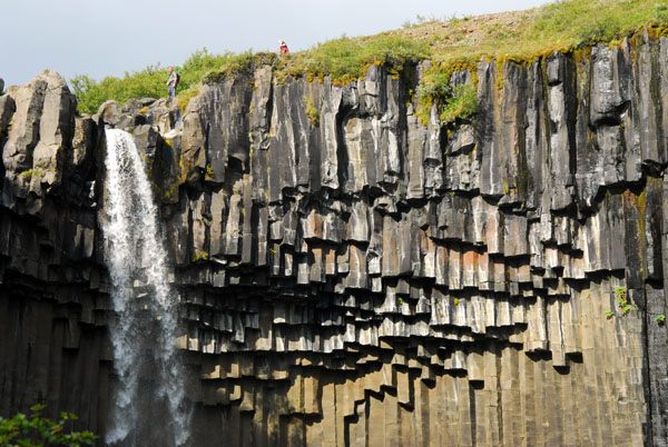 Svartfoss flowing over volcanic basalt cliffs, Skaftafell National Park