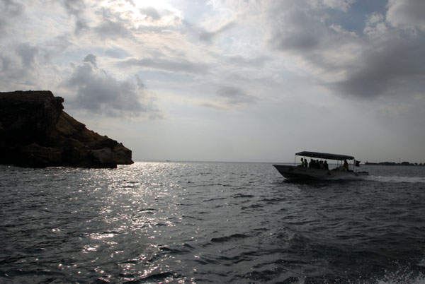 Dive boat heading to the Dimaniyat Islands