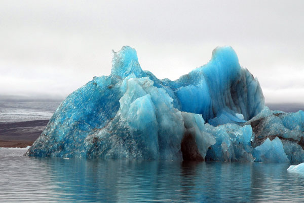 Blue iceberg - it had just rolled over showing the blue color of solid glacial ice