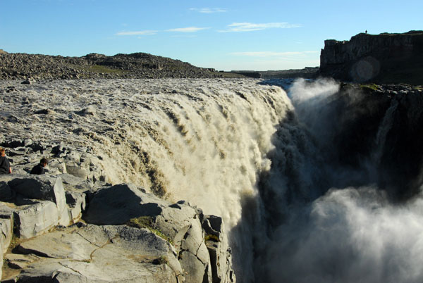 The cold, gray color of the water at Dettifoss is due to sediment from glacial water