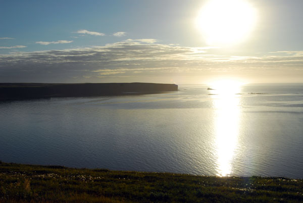 The sun low in the northwestern sky