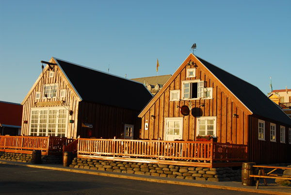 Skipasmdastdin, an old timber house by the harbor with the Gamli Baukur Restaurant