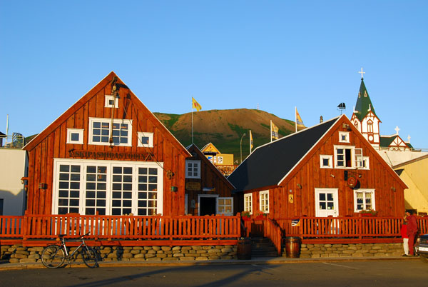 Skipasmdastdin, an old timber house by the harbor with the Gamli Baukur Restaurant