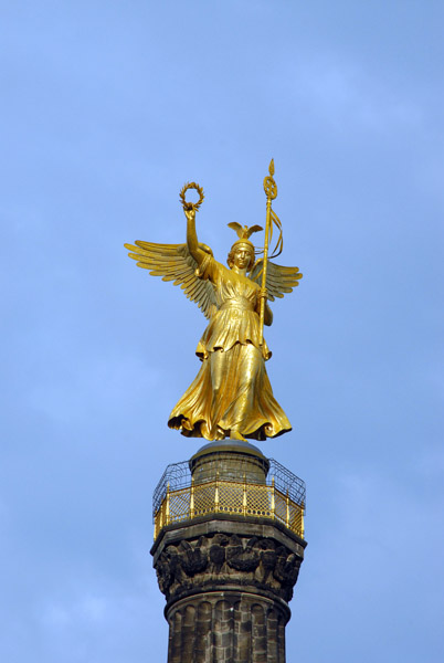 The golden angel was added after victories over Austria (1866) and France (1871)