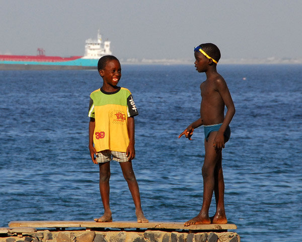Boys on the seawall, Île de Gorée