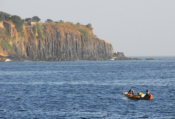 Fishing boat with the cliffs of le de Gore