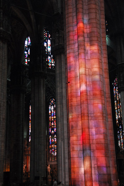 Milan Cathedral - light from the stained glass on a pillar