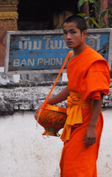 Lao monk with alms bowl