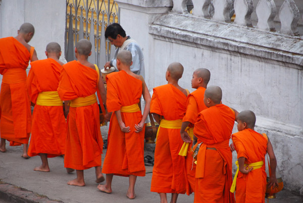 Monks receiving alms, Luang Prabang