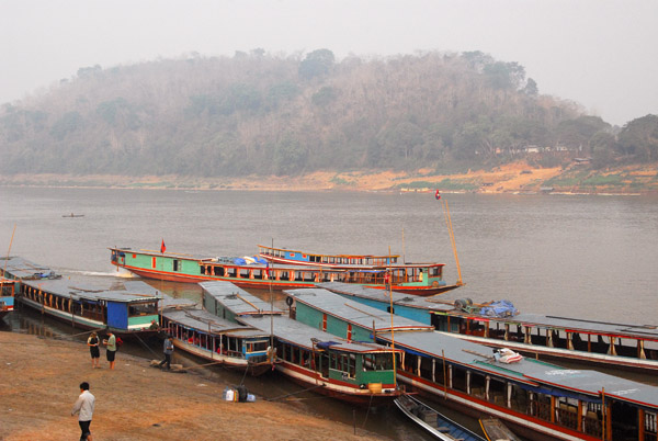 Boats waiting on the bank of the Mekong River at Luang Prabang